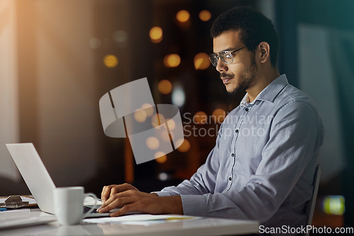 Image of Businessman, laptop and working at night in office for planning strategy, overtime research and big data report deadline. Corporate male, late and thinking with digital tech device for iot web design