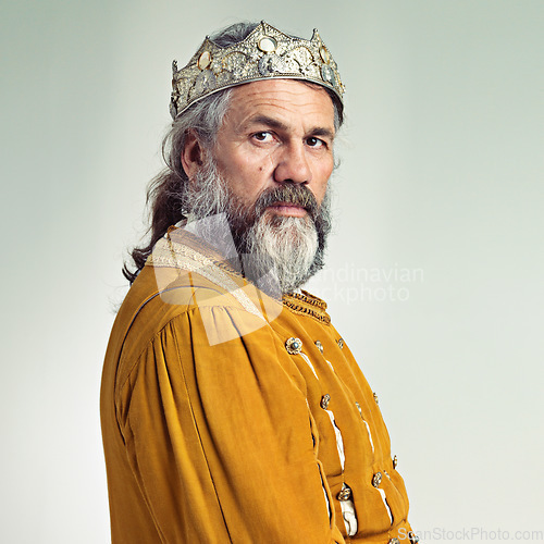 Image of King, crown with senior man and portrait, history with renaissance and royalty isolated on white background. Vintage, medieval and worship, face and male monarch mockup with gold and cosplay