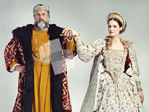 Image of Love, victorian and couple with king and queen for renaissance, royalty and vintage in England. Vintage, luxury and fantasy with portrait of man and woman for elegant, medieval and monarch in studio