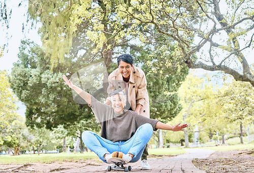 Image of Skateboard, portrait and senior friends in park for goofy, silly and comic outdoor fun together. Funny retirement women in nature with excited and happy smile for bonding leisure in Mexico.