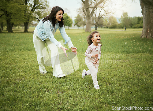 Image of Mother, girl child and running in park with love, bonding or happiness on grass field for care on holiday. Mama, kid and playful quality time to relax outdoor, woods or backyard garden for nature fun