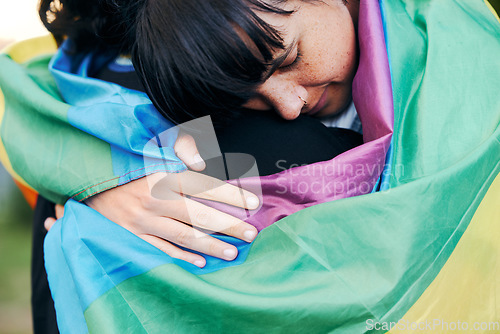 Image of Lesbian, hug and flag with women for love, lgbtq and romance, connection and acceptance. Gay, pride and rainbow flag with woman embrace lover, sweet and in love while enjoying their relationship