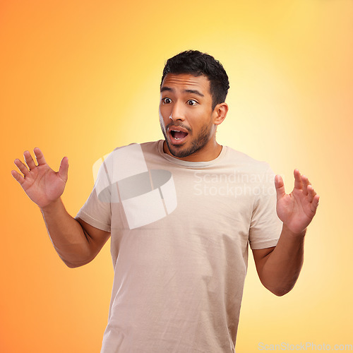 Image of Man, surprised and standing isolated on a yellow background in shock for surprise. Shocked young male looking amazed, wow or OMG expression for deal, win or achievement against a studio background