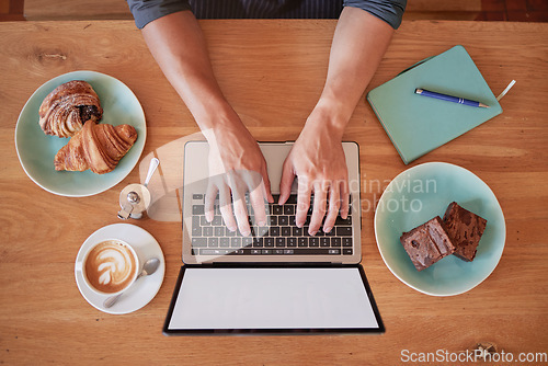 Image of Laptop, coffee shop and above man hands writing email, freelance and internet with screen mockup. Hand, remote work and social media influencer in cafe for food, review or typing blog, search or web