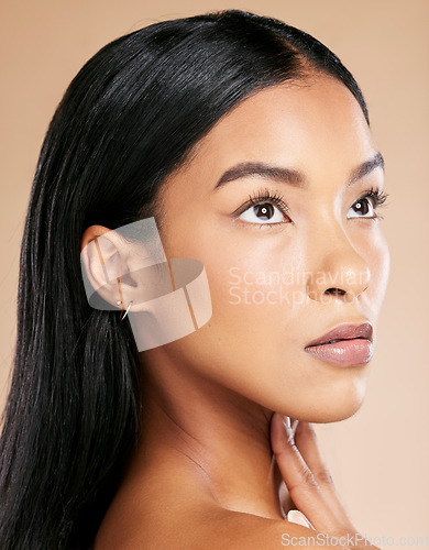 Image of Makeup, cosmetics and face of a woman thinking of beauty isolated on a studio background. Skincare, dermatology and Asian model with facial cosmetology for a spa glow, wellness and on a backdrop