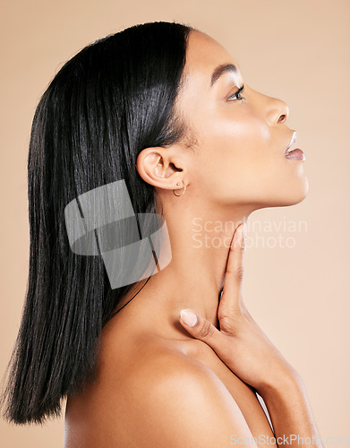 Image of Face, profile and skin with woman and hair, beauty with skincare and natural cosmetics isolated on studio background. Healthy skin, wellness and hair care with cosmetic glow and facial with keratin