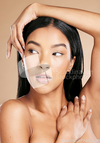 Image of Beauty, black woman and skincare of a model thinking after wellness facial and spa treatment. Dermatology, cosmetics, and face of a person from skin glow and self fare with brown studio background