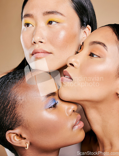 Image of Beauty, diversity and face of women with makeup for creativity isolated on studio background. Skincare, cosmetology and model friends with facial cosmetics foundation in different shades on backdrop