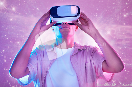 Image of Futuristic, virtual reality and man in universe space on 3d technology headset. Vr metaverse, pink neon and male exploring a future cyber galaxy, aerospace or stars, gaming and ai simulation online.