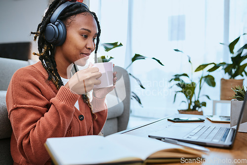 Image of Elearning, studying and woman with laptop and coffee for education, university work and virtual course. Email, happy and online student with tea reading feedback on a project on a computer in a house