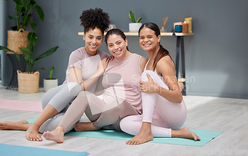 Image of Pregnant, portrait or women in yoga class with a happy smile ready for exercise or fitness workout in studio. Pregnancy, relaxing or healthy friends hugging or bonding in maternity start training