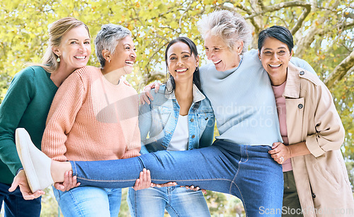 Image of Senior women, portrait and silly fun in bonding, comic games and goofy energy activity in nature park, garden and environment. Smile, happy and diversity elderly friends in retirement community group