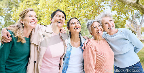 Image of Senior women, people or bonding hug while bird watching in nature park, spring garden or relax environment. Smile, happy or diversity elderly friends in retirement support, trust or community social