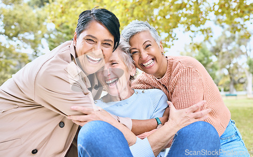 Image of Retirement, women or laughing portrait in funny hug game, comic bonding or silly group activity in relax environment Smile, happy or elderly senior friends in nature park, grass garden or community