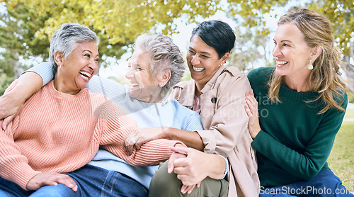 Image of Happy senior women, laughing or bonding in nature park, grass garden or relax environment in retirement, support or trust. Smile, diversity or elderly friends in comic joke, funny meme or emoji face