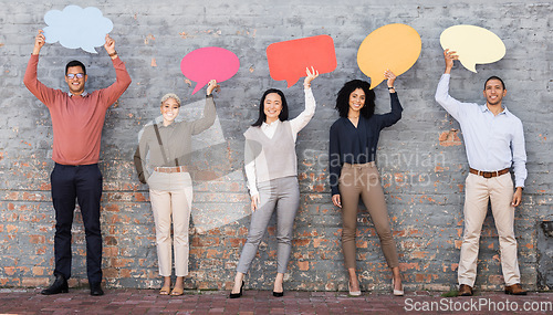 Image of Speech bubble, communication and news with business people and mockup for social media, vote and review. Design, contact and chat sign with employee and board at brick wall for voice and opinion