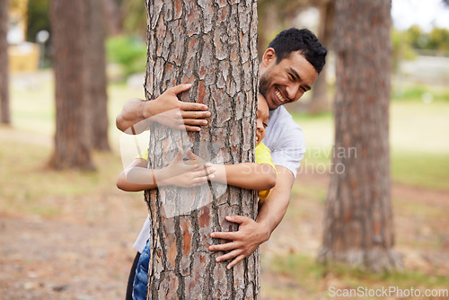 Image of Nature, environment and people hug trees for save the planet, deforestation or community support project. Earth day sustainability, eco friendly NGO charity and happy volunteer protect natural growth