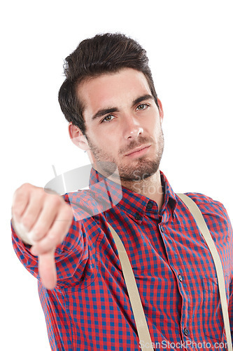 Image of Sad, fail and portrait of a man with a thumbs down for no isolated on a white background in a studio. Angry, frustrated and person with a hand gesture for a problem or recommendation on a backdrop