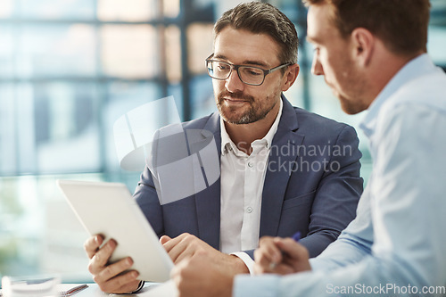 Image of Tablet, meeting and teamwork of business people in office discussion. Collaboration, technology and men or employees with touchscreen planning sales, marketing or advertising strategy in company.