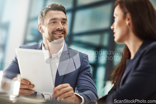 Image of Tablet, teamwork and business people meeting in office workplace. Collaboration, technology and man, woman or employees with touchscreen planning sales strategy or researching finance plan in company