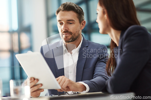 Image of Teamwork, tablet and business people in office talking in company workplace. Collaboration, technology and woman, man or employees with touchscreen planning sales, marketing or advertising strategy.