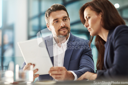 Image of Tablet, meeting and teamwork of business people in office workplace. Collaboration, technology and man, woman or workers with touchscreen planning sales, analysis or strategy in company.