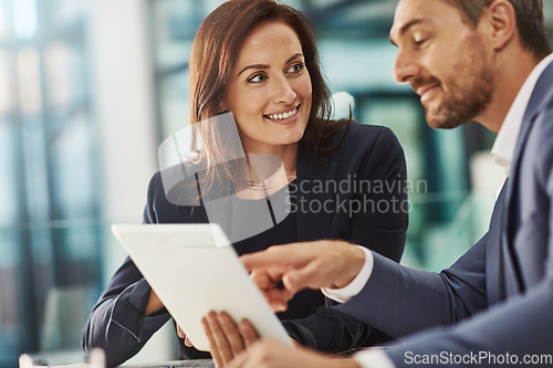 Image of Training, coaching and business people with tablet in office workplace. Collaboration, mentor and woman and man pointing at touchscreen technology planning sales, financial or research and strategy.