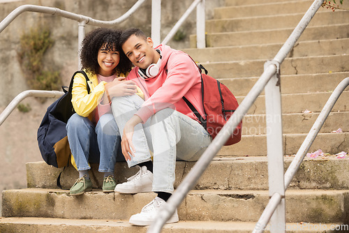 Image of Portrait, education and stairs with student black couple sitting outdoor together on university campus. Love, learning and college with a man and woman bonding on steps while relaxing outside