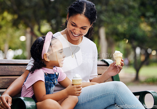 Image of Summer, park and ice cream with a mother and daughter bonding together while sitting on a bench outdoor in nature. Black family, children and garden with a woman and girl enjoying a sweet snack