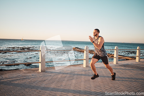 Image of Running, sea and mockup with a man runner training outdoor on the promenade for cardio or endurance. Fitness, ocean and mock with a sports male taking a run on the coast for health or wellness