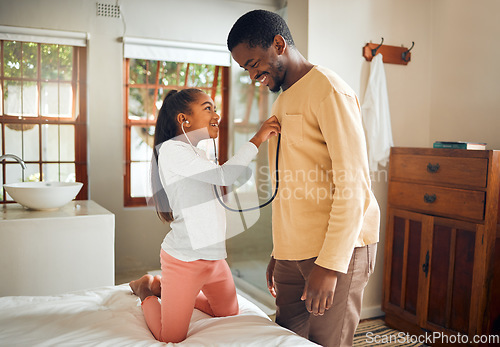 Image of Father, girl and play with stethoscope in home, caring and bonding in bedroom. Black family, love or man with kid holding medical toy listening to heartbeat, doctor pretend and enjoying time together