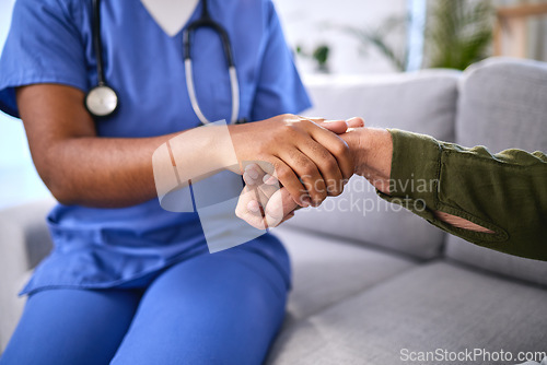 Image of Closeup, doctor holding patient hand and support with diagnosis, test results and healthcare. Medical professional, woman and nurse with female hands, hope and help with terminal disease and illness