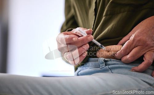 Image of Stomach injection, medicine and needle with hand holding vaccine of insulin shot for healthcare. Medical, health and woman using treatment for virus, disease or sick body for safety and care