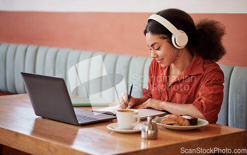 Image of Cafe, girl or student writing in notebook planning or studying schedule for time management. College, school education or university learner working or learning via an an online course in coffee shop