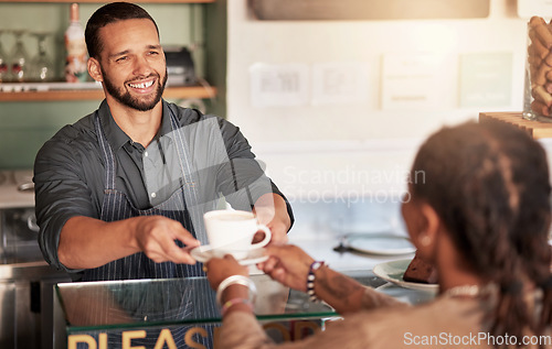 Image of Coffee, cafe and barista serving customer a cup of latte in small business. Restaurant, cappuccino and waiter, man and server giving fresh mug of caffeine or espresso to female shopper in store.