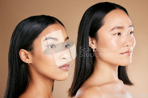 Image of Face, skincare and diversity with model woman friends closeup in studio on a beige background. Beauty, facial or cosmetics with an attractive young female and friend posing to promote a skin product