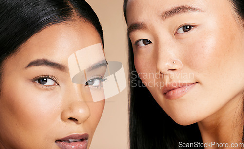 Image of Diversity women, beauty and skincare portrait in studio for dermatology, makeup and cosmetics. Asian and black person together for foundation skin glow, spa facial and eyes of friends for wellness