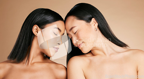 Image of Beauty, diversity and faces with skincare glow and cosmetic self care for the skin. Facial, dermatology and spa treatment for friends or models isolated against a brown studio background