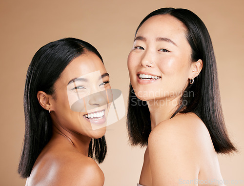 Image of Diverse, beauty and portrait of women with makeup isolated on a studio background. Smile, dermatology and face of model friends with happiness for foundation shade diversity on a beige backdrop