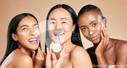 Image of Beauty, face cream and portrait of friends in studio for wellness, grooming and hygiene on brown background. Women, skincare and lotion for girl group with different, facial and product or isolated