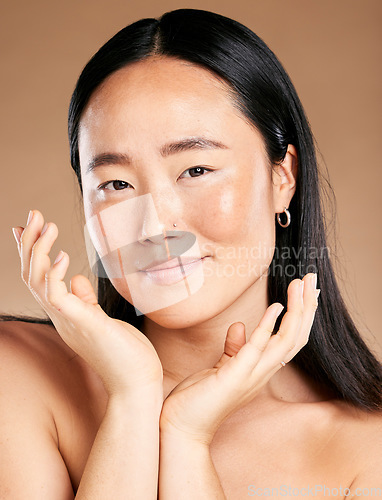 Image of Portrait, face or Japanese woman in beauty, skincare or grooming routine isolated on studio background. Hands, relaxed or beautiful Asian girl model smiles in luxury facial treatment with self care