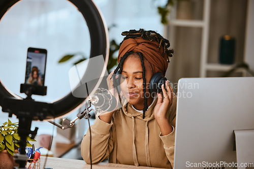 Image of Communication, phone and influencer streaming podcast, radio talk show or speaker talking about teen culture. Presenter, black woman or host speaking about student news on online broadcast microphone