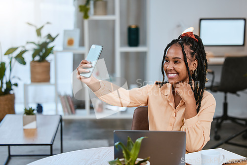 Image of Business woman, selfie and phone in a home office for social media profile update with a laptop. Black person happy while working on startup growth while online for target audience brand awareness