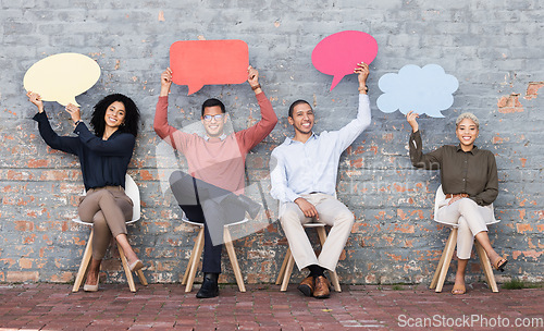 Image of Speech bubble, feedback and idea with business people and mockup for social media, vote and review. Design, contact and chat sign with employee and board at brick wall for voice, opinion and news