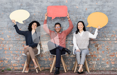 Image of Speech bubble, networking and feedback with business people and mockup for social media, vote and review. Design, contact and chat sign with employee and board at brick wall for voice and opinion