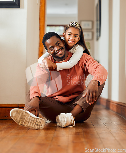 Image of Portrait, hug and family by father and daughter in their home, relax and smile while bonding indoors. Black man, embrace and girl with parent on a floor, cheerful and content in their house