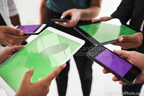 Image of Hands, green screen and mockup with a business team in studio isolated on a white background for communication or networking. Tablet, phone and technology with an employee group on blank space