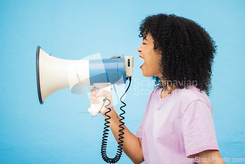 Image of Megaphone noise, shout and black woman protest for democracy vote with voice, justice or human rights rally. Racism opinion, microphone speech and profile speaker isolated on blue background studio