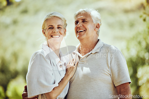 Image of Love, senior couple and hug outdoor, retirement and quality time for bonding, adventure and romance. Romantic, mature woman and old man embrace, nature and loving together with smile and summer break