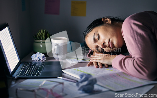 Image of Sleeping, tired and fatigue student at night for study, learning and university depression, mental health or burnout on laptop. Depressed, stress and college woman with exam notebook on desk in dark